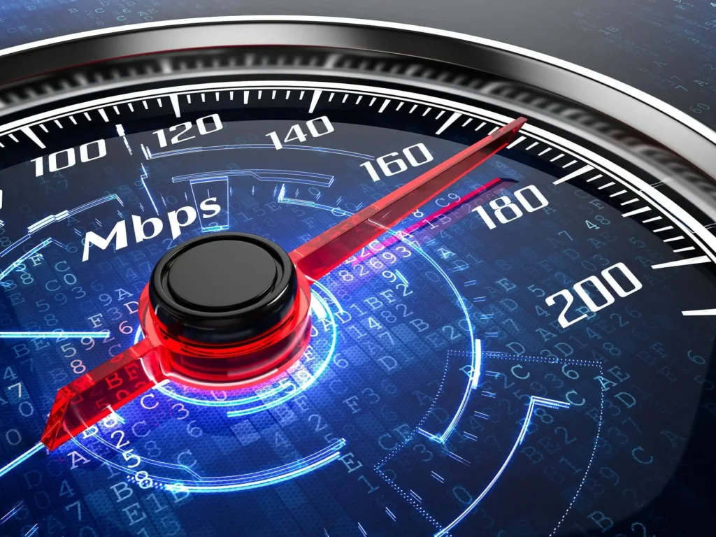 Rychlost internetu v Česku: Ilustrace rychloměru ukazujícího hodnoty v Mbps, symbolizující růst a vývoj vysokorychlostního připojení v zemi.