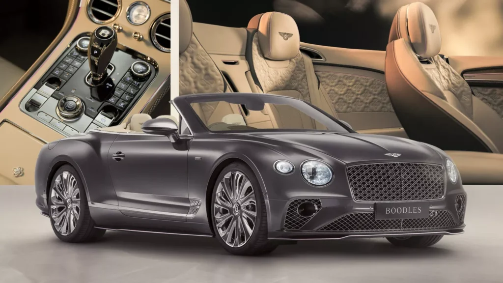 Bentley Continental GTC Mulliner edice v šedé barvě Porpoise Grey s interiérem v barvě Linen, zdobený růžovými akcenty od Boodles. Detaily interiéru zahrnují diamantový přívěsek z bílého zlata na středové konzoli a luxusní prvky šperkařského umění.