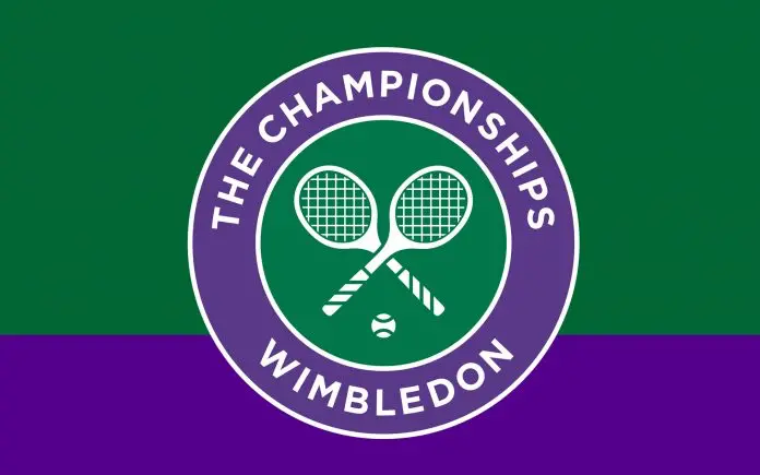 Logo Wimbledonu s dvěma zkříženými tenisovými raketami a tenisovým míčkem v kruhu s nápisem "The Championships Wimbledon" na zeleno-fialovém pozadí.