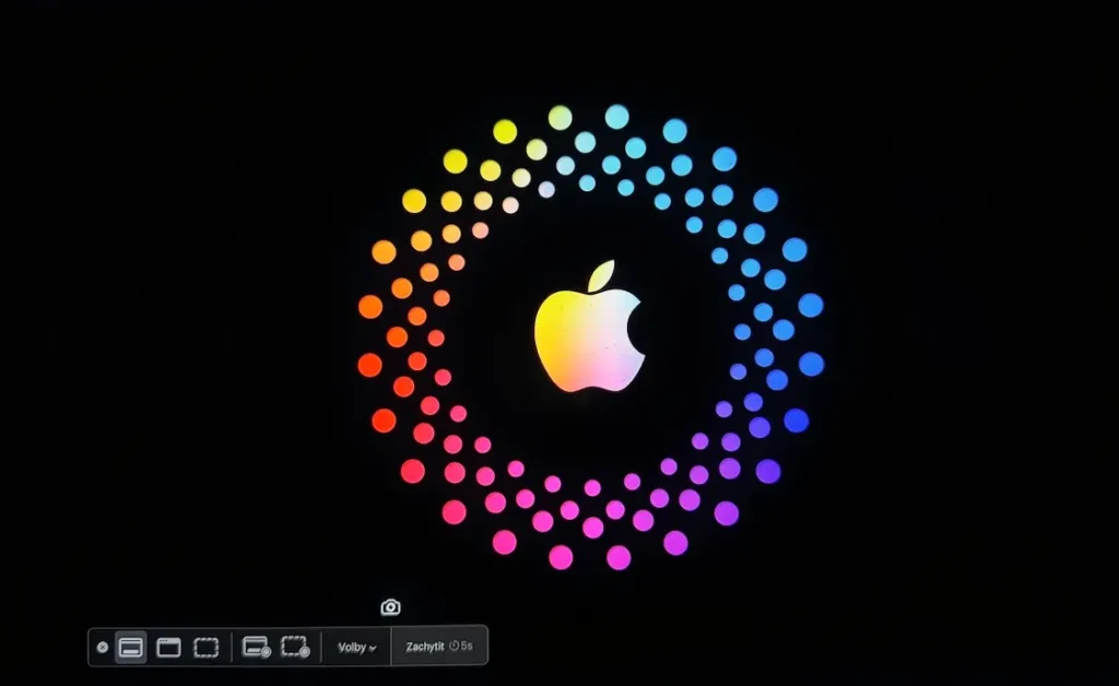 Rozhraní pro záznam obrazovky v macOS s barevným logem Apple uprostřed a ikonami pro výběr záznamu ve spodní části obrazovky.